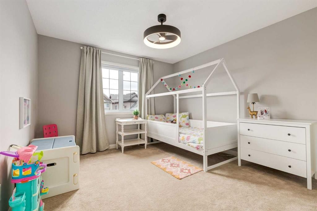3117 Don Ethell Boulevard Sw, Calgary, AB - Indoor Photo Showing Bedroom