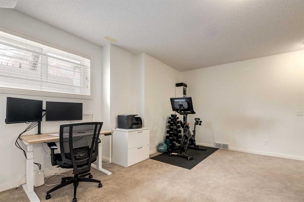 3117 Don Ethell Boulevard Sw, Calgary, AB - Indoor Photo Showing Office