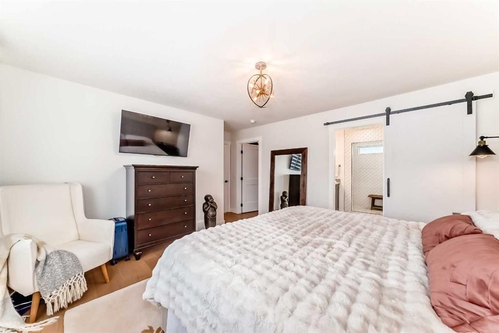 19 Mackay Drive Sw, Calgary, AB - Indoor Photo Showing Bedroom