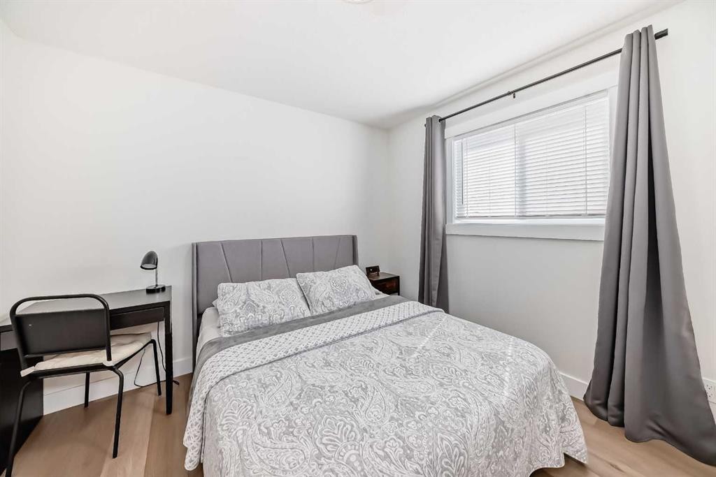 19 Mackay Drive Sw, Calgary, AB - Indoor Photo Showing Bedroom