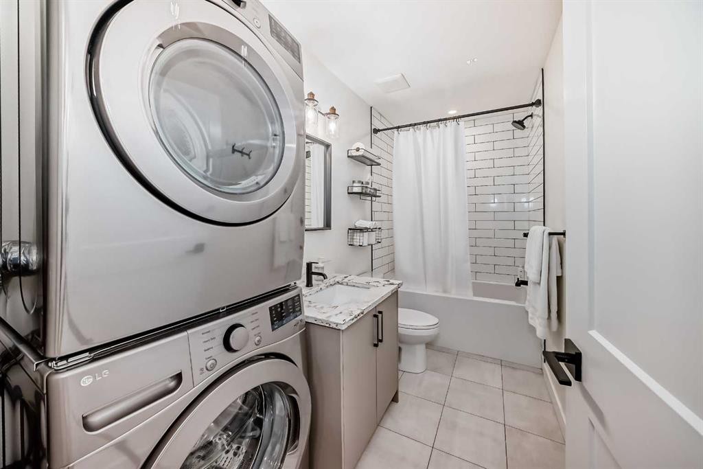 19 Mackay Drive Sw, Calgary, AB - Indoor Photo Showing Laundry Room