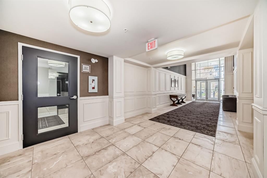 105-121 Quarry Way Se, Calgary, AB - Indoor Photo Showing Other Room