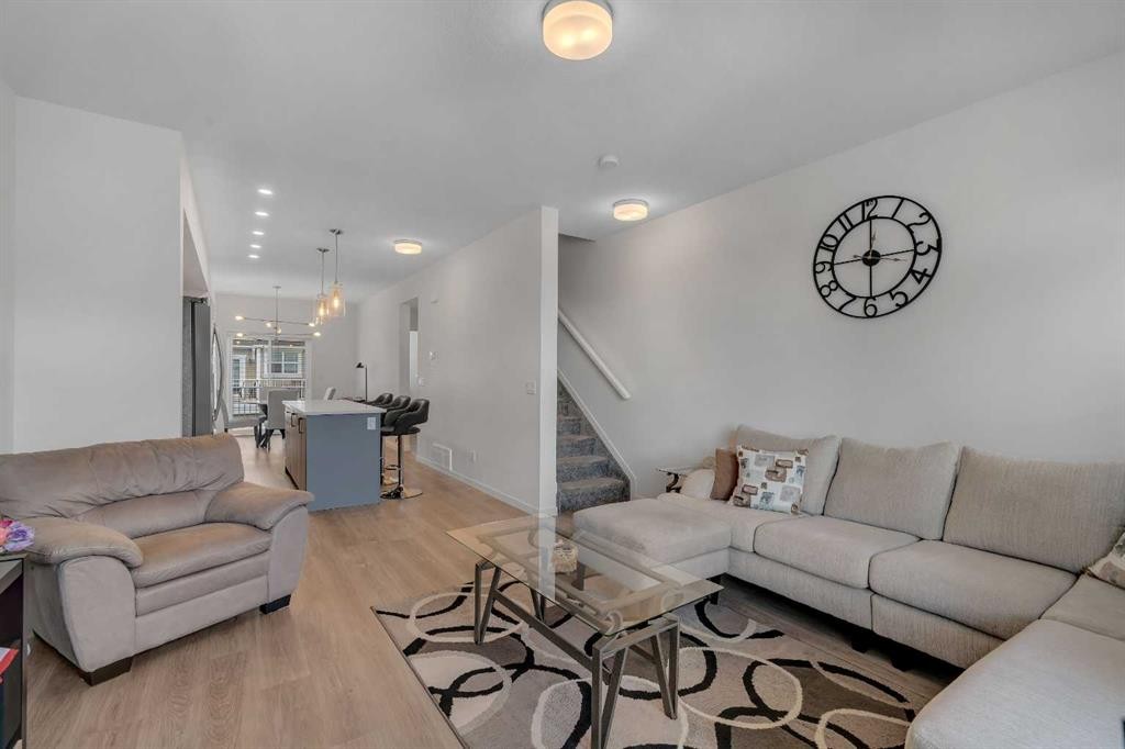 554 Copperstone Manor Se, Calgary, AB - Indoor Photo Showing Living Room