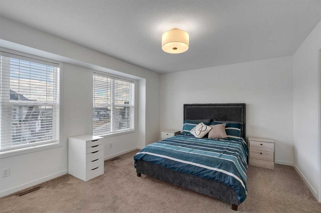554 Copperstone Manor Se, Calgary, AB - Indoor Photo Showing Bedroom