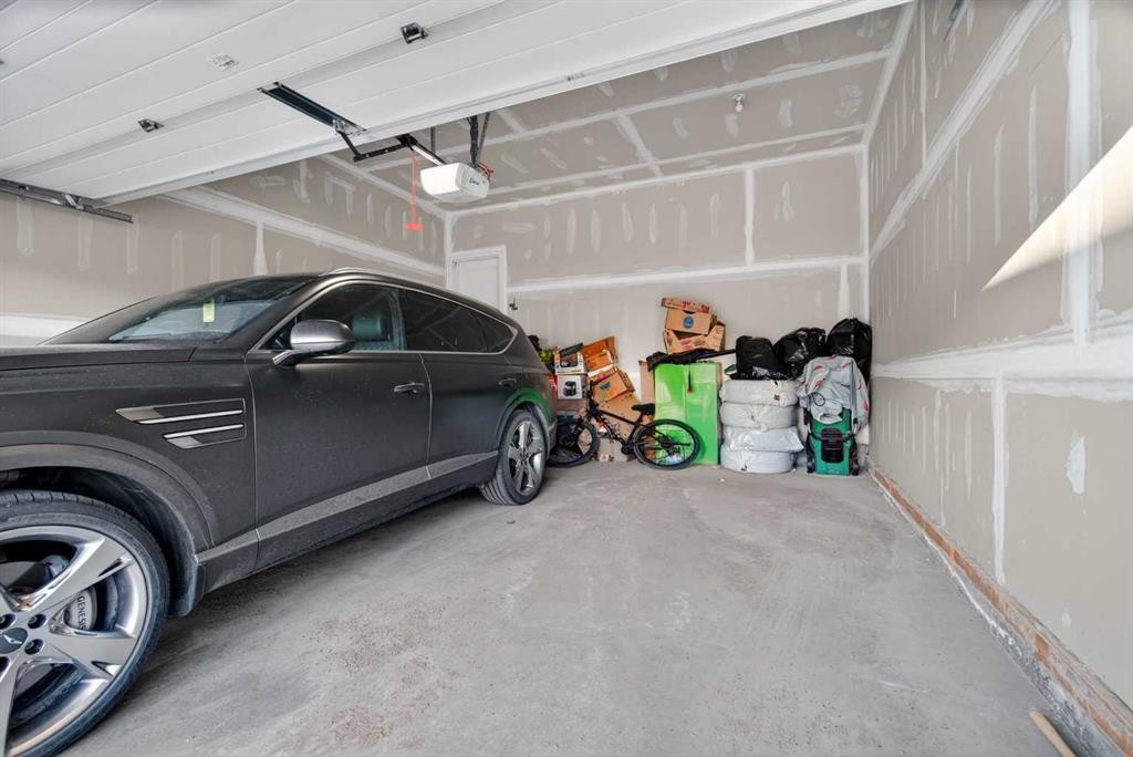 36 Royston Rise Nw, Calgary, AB - Indoor Photo Showing Garage