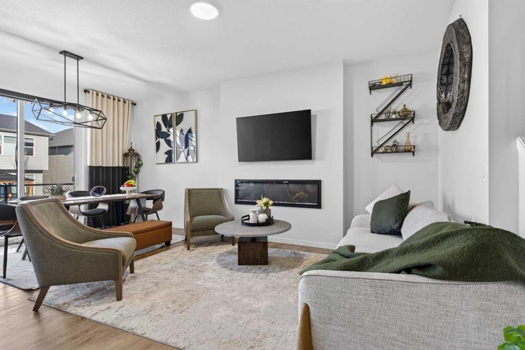 36 Royston Rise Nw, Calgary, AB - Indoor Photo Showing Other Room With Fireplace