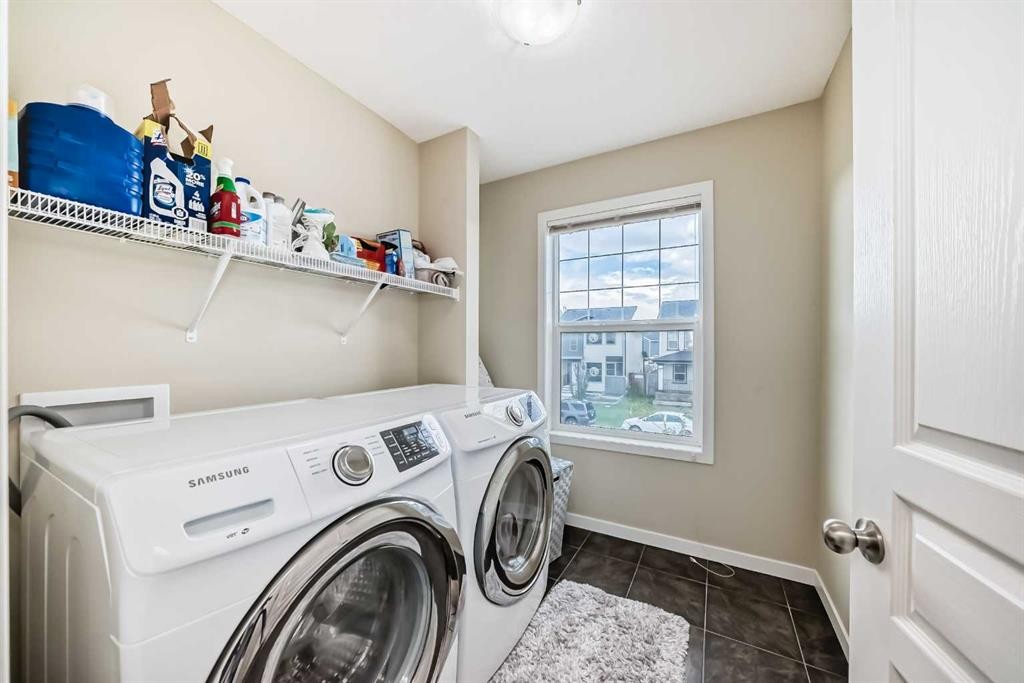 144 Copperpond Parade Se, Calgary, AB - Indoor Photo Showing Laundry Room