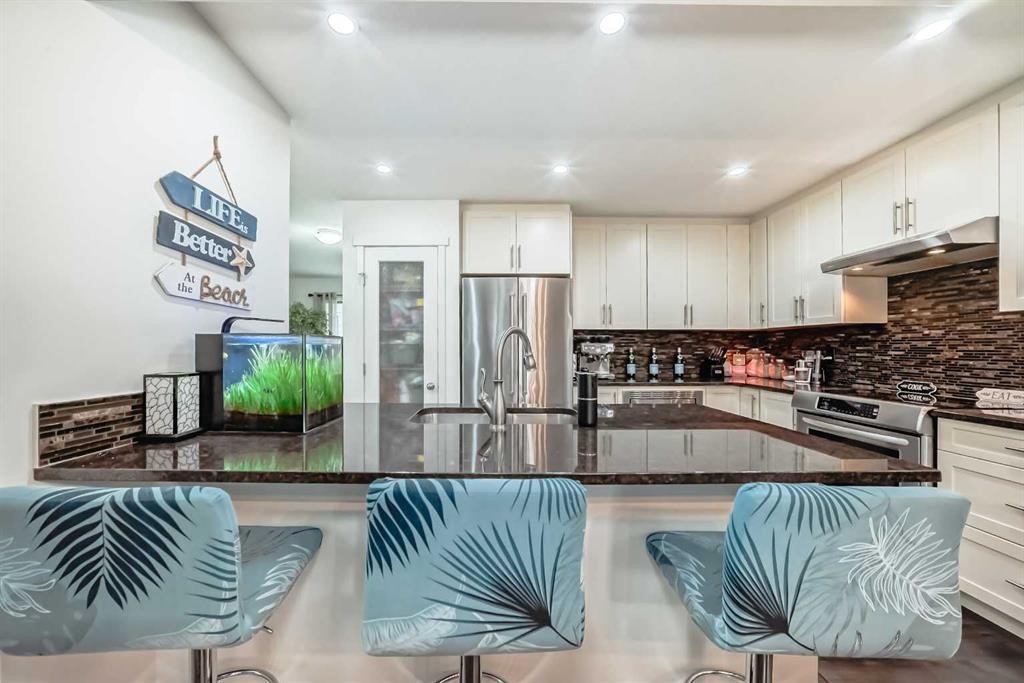 144 Copperpond Parade Se, Calgary, AB - Indoor Photo Showing Kitchen With Stainless Steel Kitchen