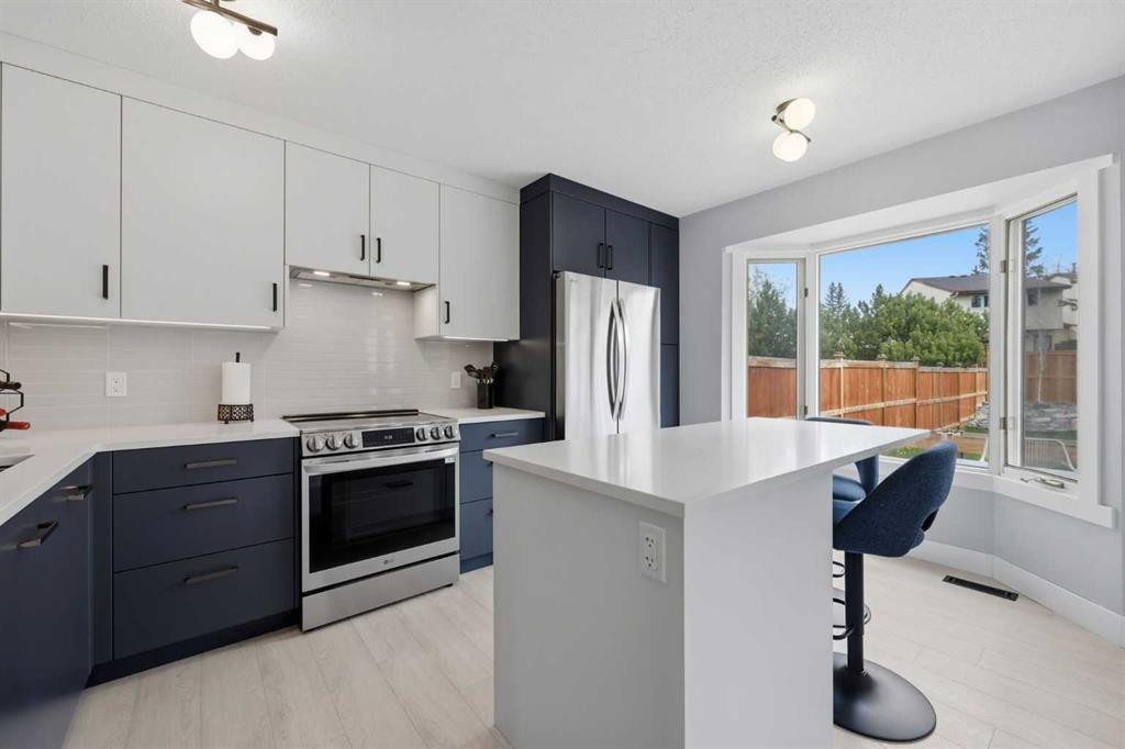 160 Silvergrove Hill Nw, Calgary, AB - Indoor Photo Showing Kitchen With Stainless Steel Kitchen With Upgraded Kitchen