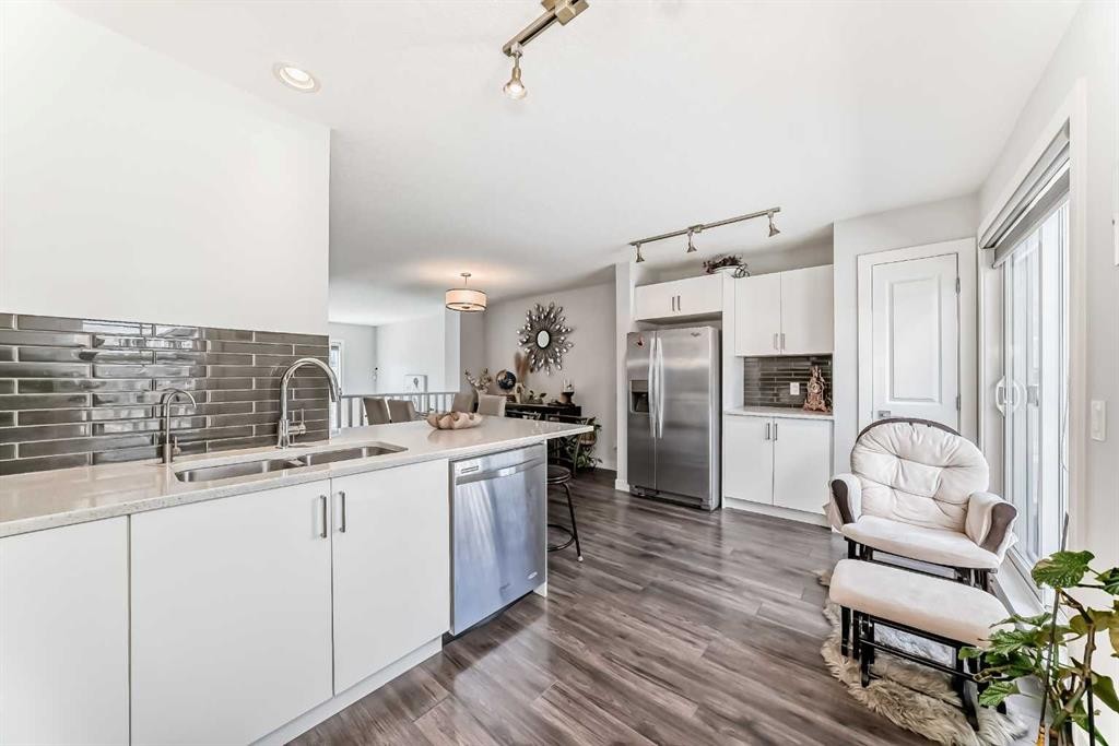 551 Evanston Link Nw, Calgary, AB - Indoor Photo Showing Kitchen With Double Sink