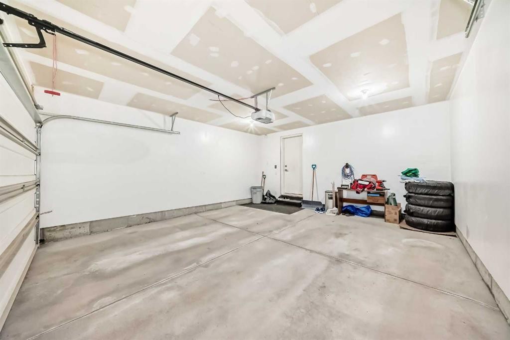 551 Evanston Link Nw, Calgary, AB - Indoor Photo Showing Garage