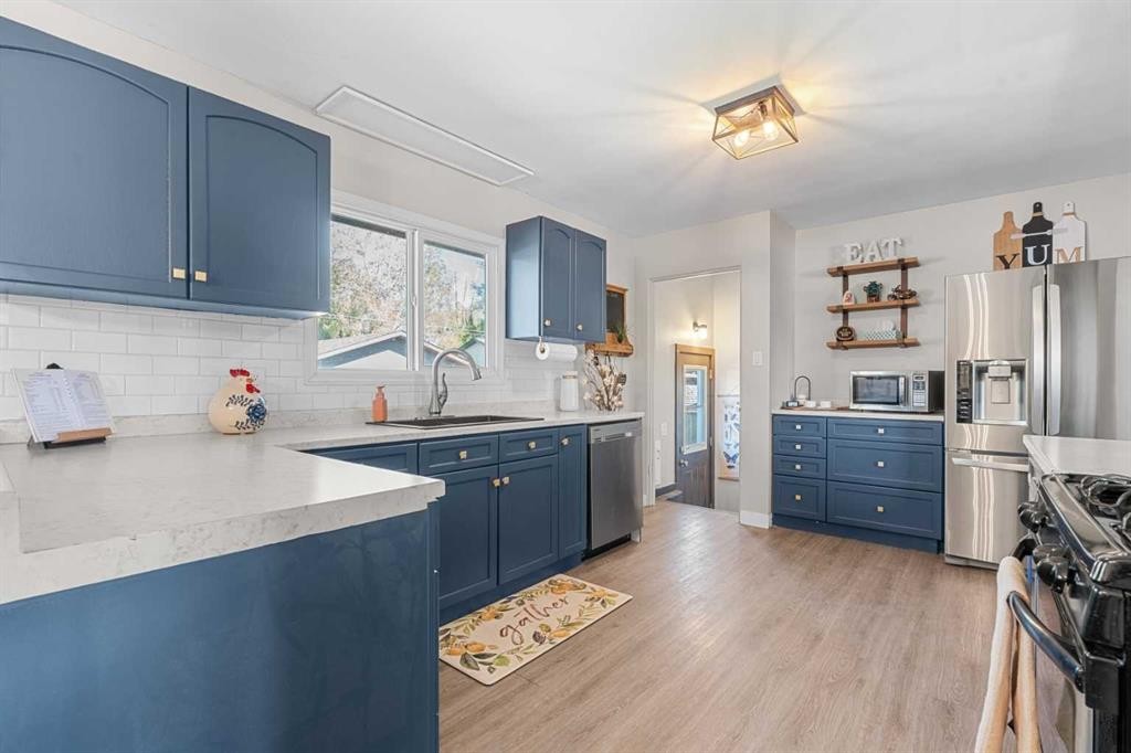 518B Highwood, Longview, AB - Indoor Photo Showing Kitchen With Stainless Steel Kitchen With Upgraded Kitchen