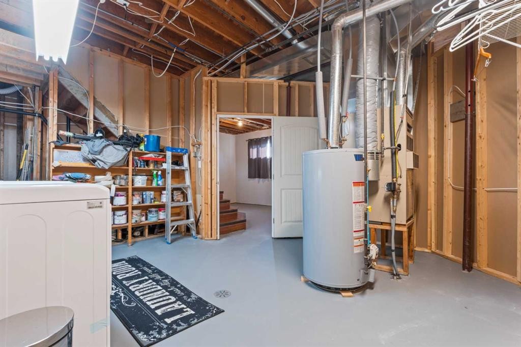 518B Highwood, Longview, AB - Indoor Photo Showing Basement