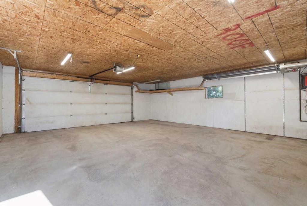 518B Highwood, Longview, AB - Indoor Photo Showing Garage