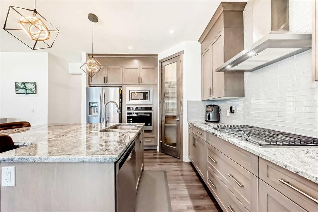 65 Saddlestone Green Ne, Calgary, AB - Indoor Photo Showing Kitchen With Upgraded Kitchen