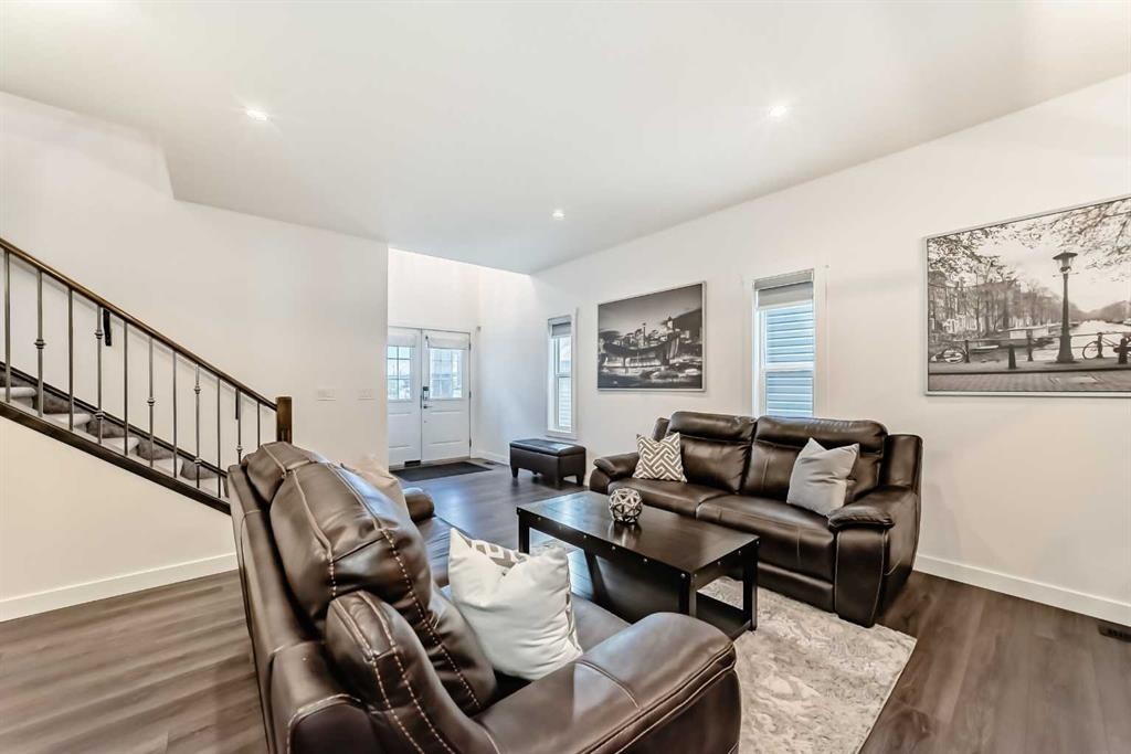 65 Saddlestone Green Ne, Calgary, AB - Indoor Photo Showing Living Room