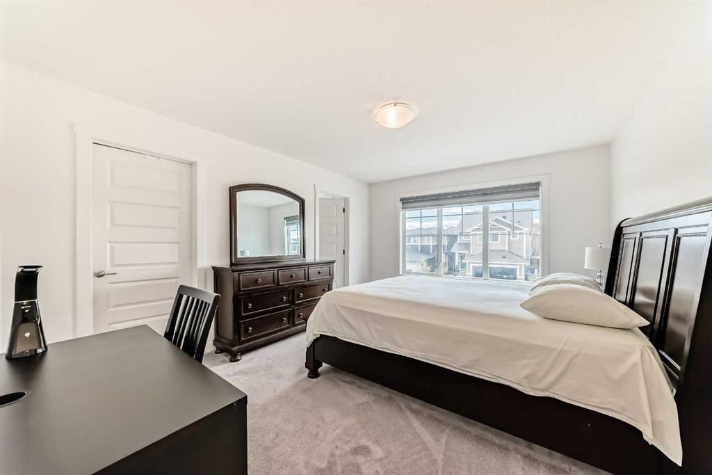 65 Saddlestone Green Ne, Calgary, AB - Indoor Photo Showing Bedroom
