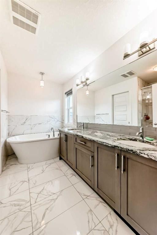 65 Saddlestone Green Ne, Calgary, AB - Indoor Photo Showing Bathroom
