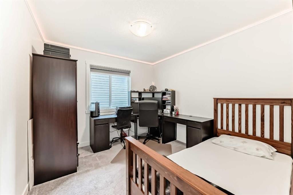 65 Saddlestone Green Ne, Calgary, AB - Indoor Photo Showing Other Room