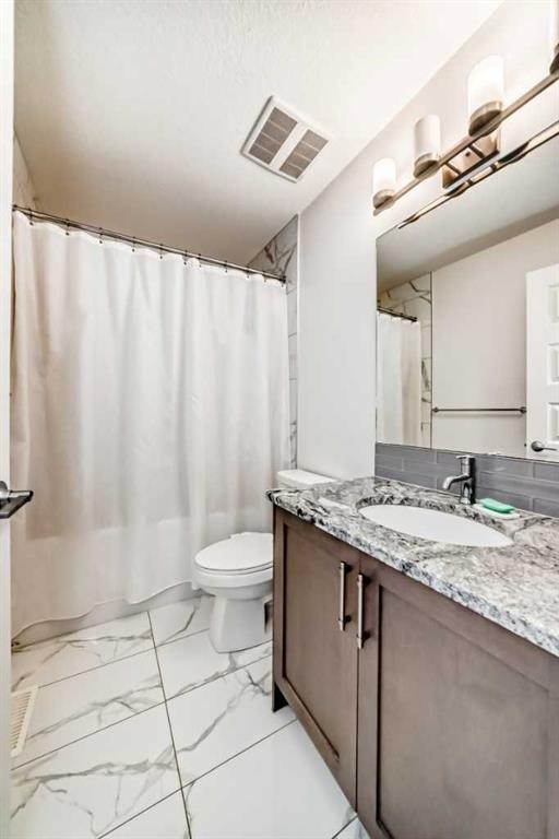 65 Saddlestone Green Ne, Calgary, AB - Indoor Photo Showing Bathroom