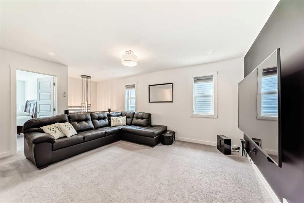 65 Saddlestone Green Ne, Calgary, AB - Indoor Photo Showing Living Room