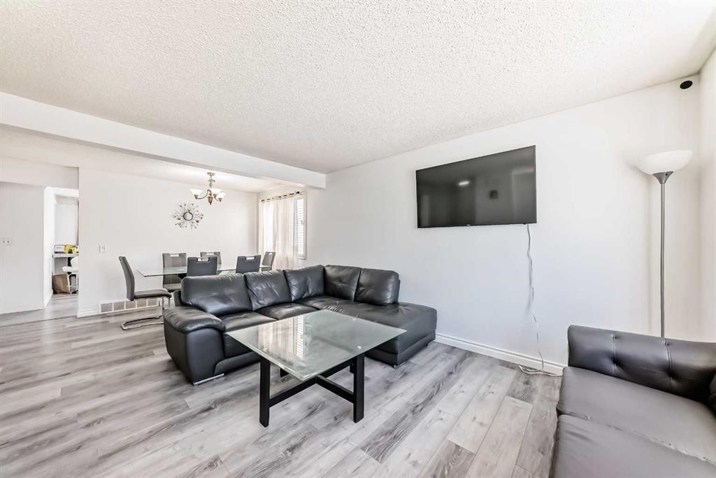 279 Falton Drive Ne, Calgary, AB - Indoor Photo Showing Living Room