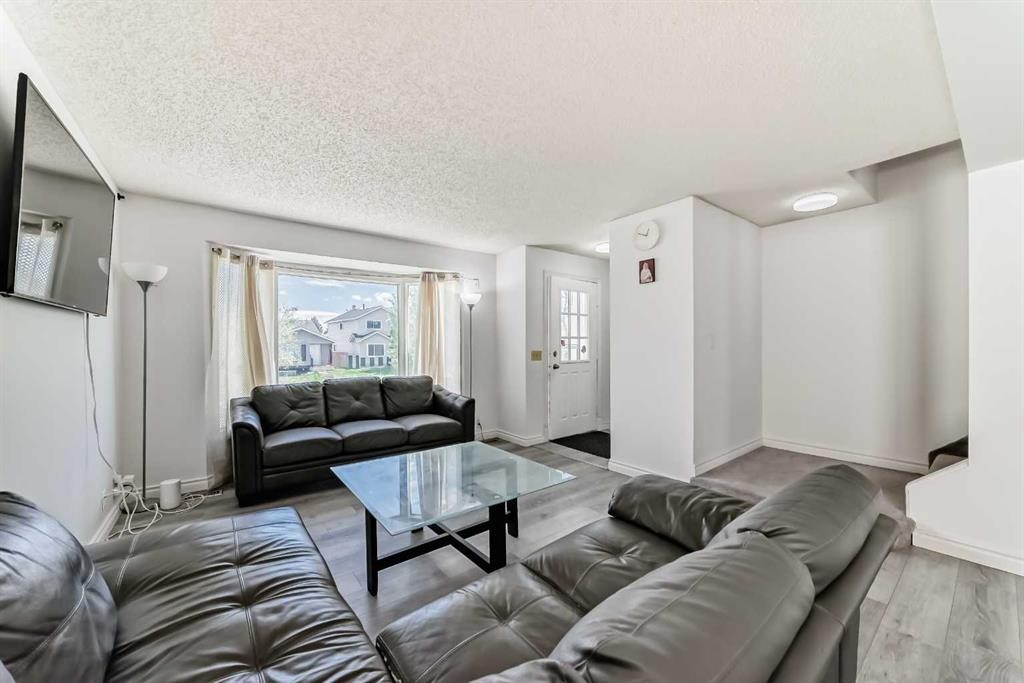 279 Falton Drive Ne, Calgary, AB - Indoor Photo Showing Living Room
