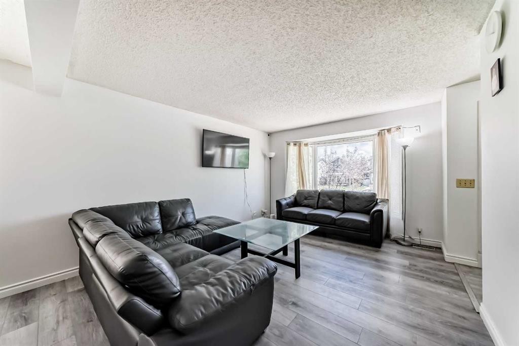 279 Falton Drive Ne, Calgary, AB - Indoor Photo Showing Living Room