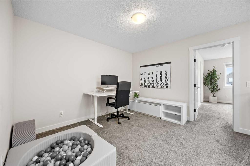 72 Seton Villas Se, Calgary, AB - Indoor Photo Showing Other Room