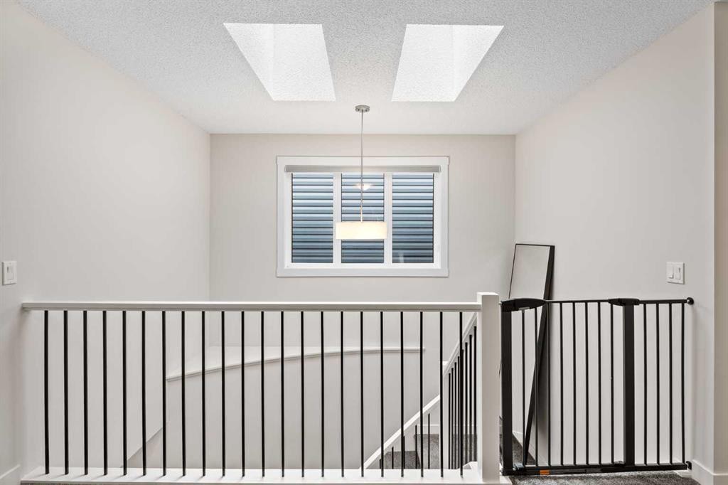 72 Seton Villas Se, Calgary, AB - Indoor Photo Showing Other Room