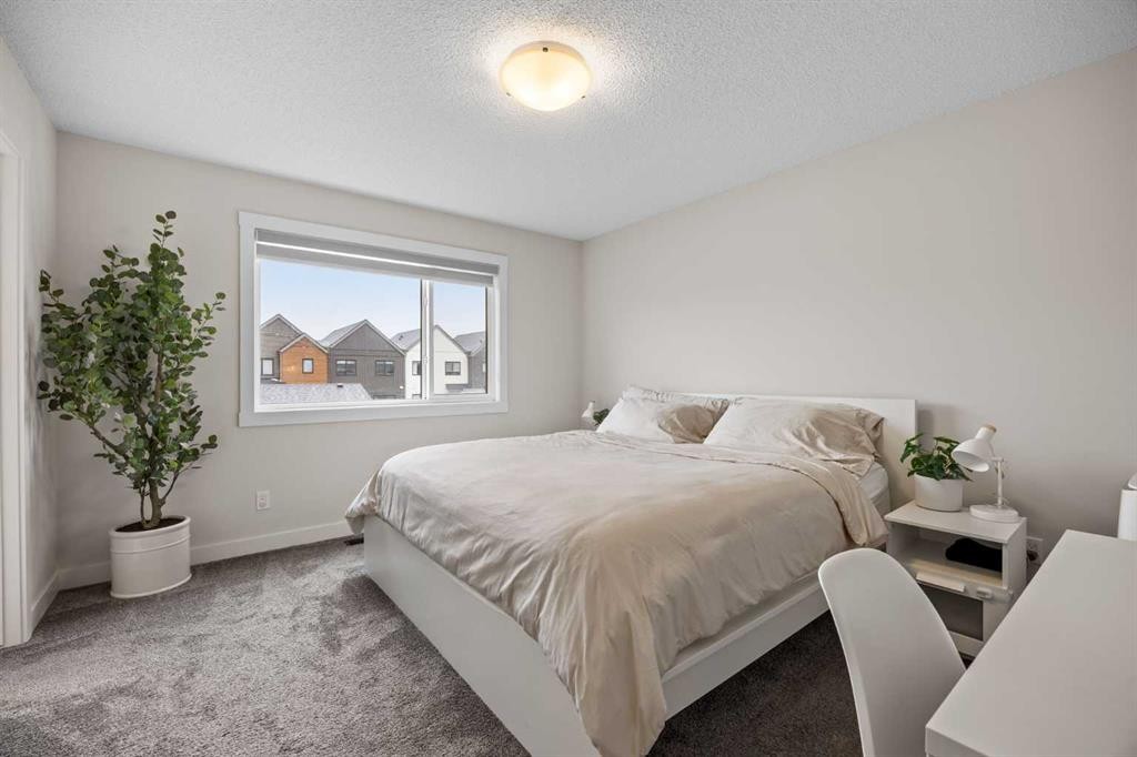 72 Seton Villas Se, Calgary, AB - Indoor Photo Showing Bedroom