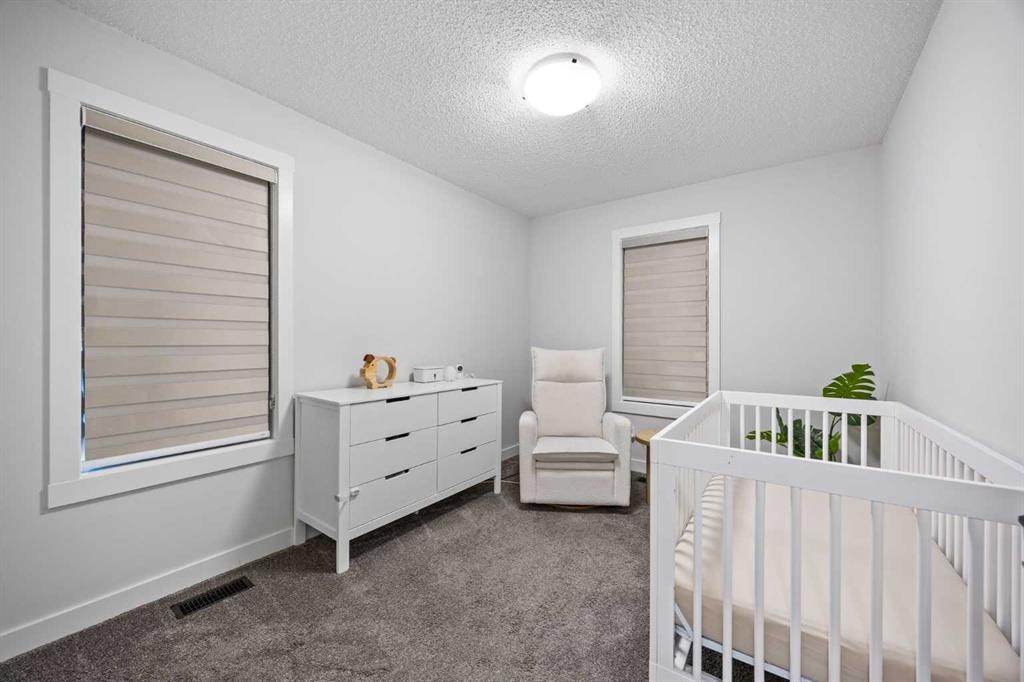 72 Seton Villas Se, Calgary, AB - Indoor Photo Showing Bedroom