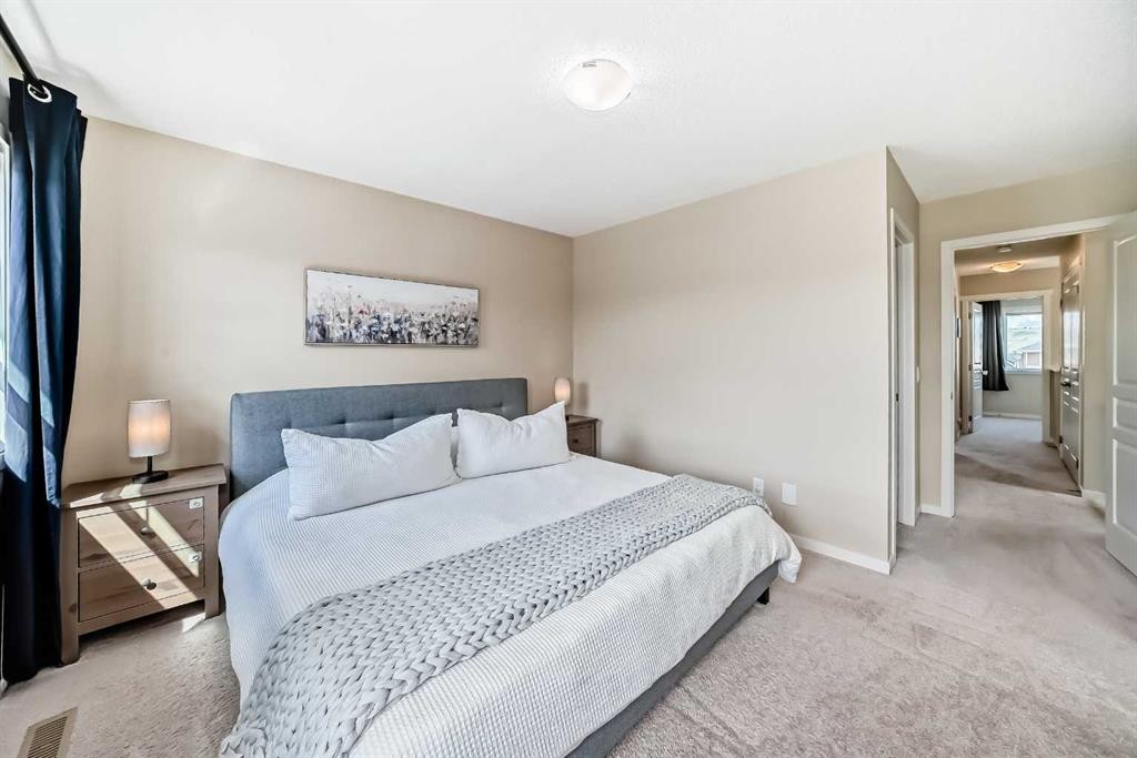 199 River Heights Green, Cochrane, AB - Indoor Photo Showing Bedroom