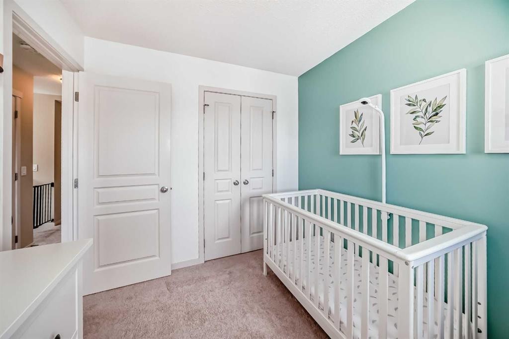 199 River Heights Green, Cochrane, AB - Indoor Photo Showing Bedroom