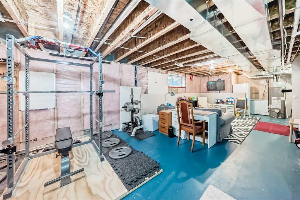 199 River Heights Green, Cochrane, AB - Indoor Photo Showing Basement
