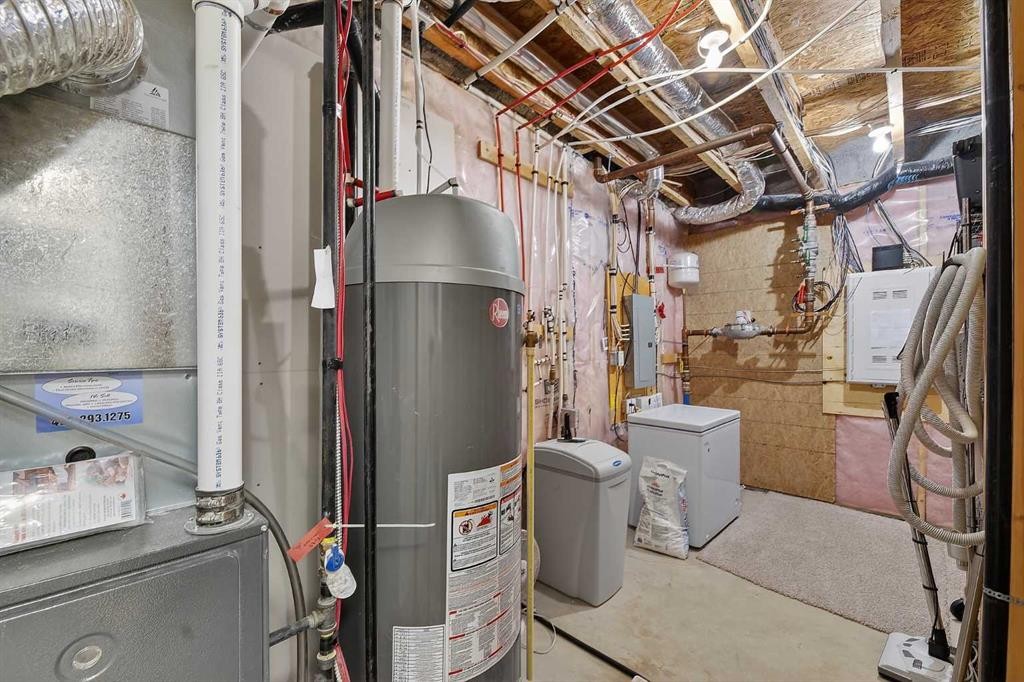 43 Cortina Villas Sw, Calgary, AB - Indoor Photo Showing Basement