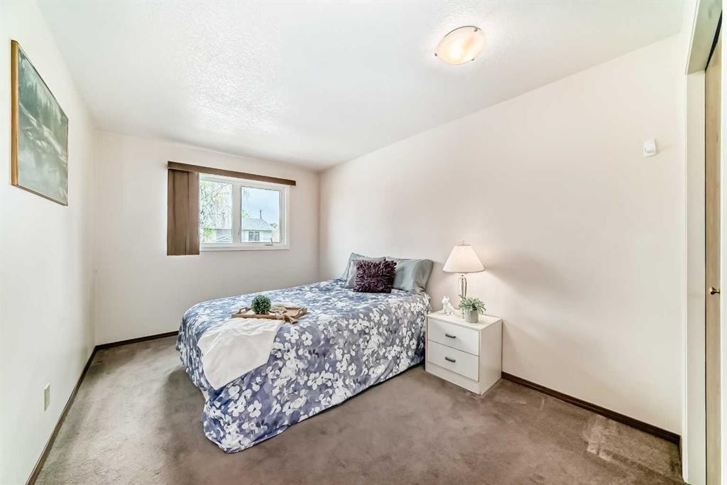 41 Alder Crescent Se, Airdrie, AB - Indoor Photo Showing Bedroom