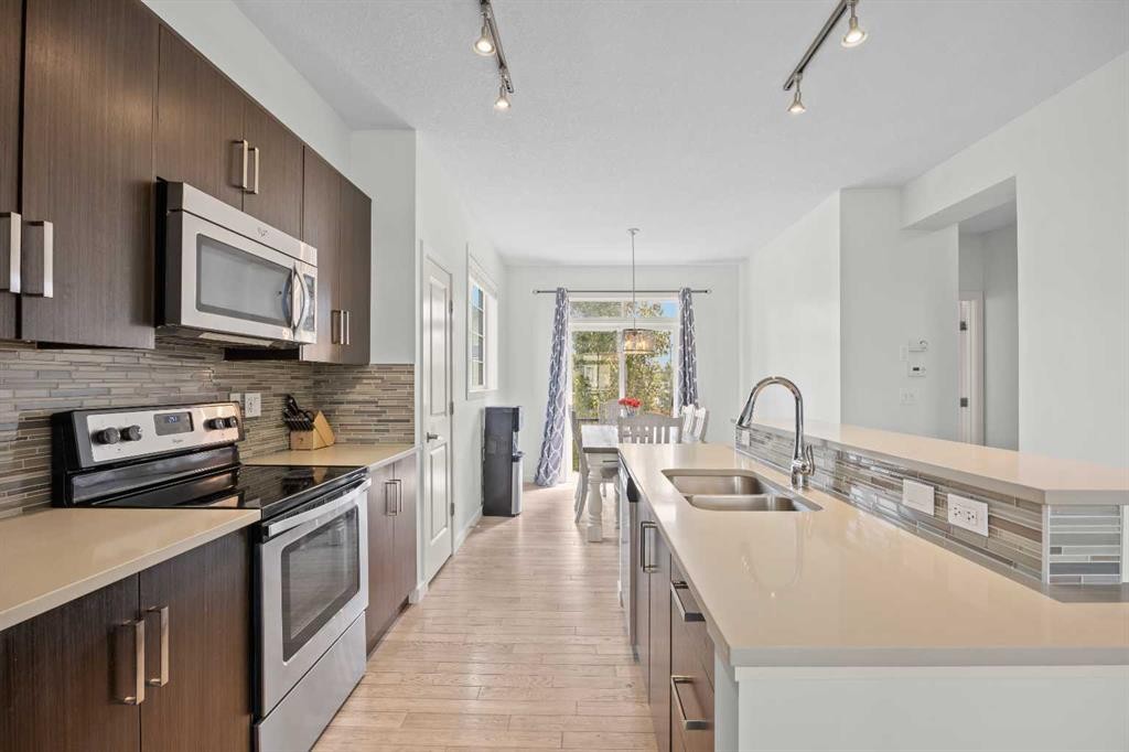 134 Walden Circle Se, Calgary, AB - Indoor Photo Showing Kitchen With Double Sink With Upgraded Kitchen