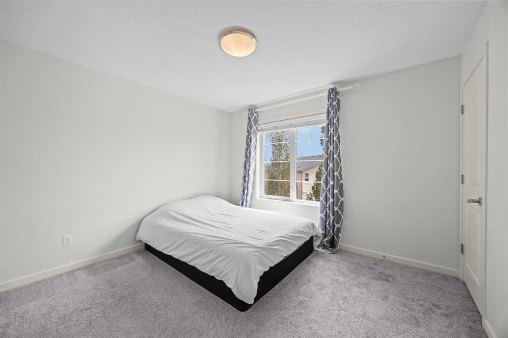 134 Walden Circle Se, Calgary, AB - Indoor Photo Showing Bedroom