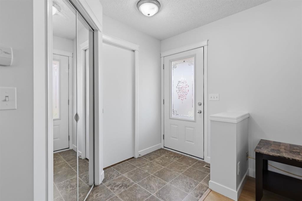80 Prestwick Bay Se, Calgary, AB - Indoor Photo Showing Other Room