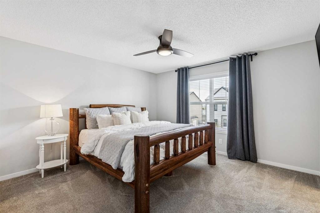 43 Willow Crescent, Okotoks, AB - Indoor Photo Showing Bedroom