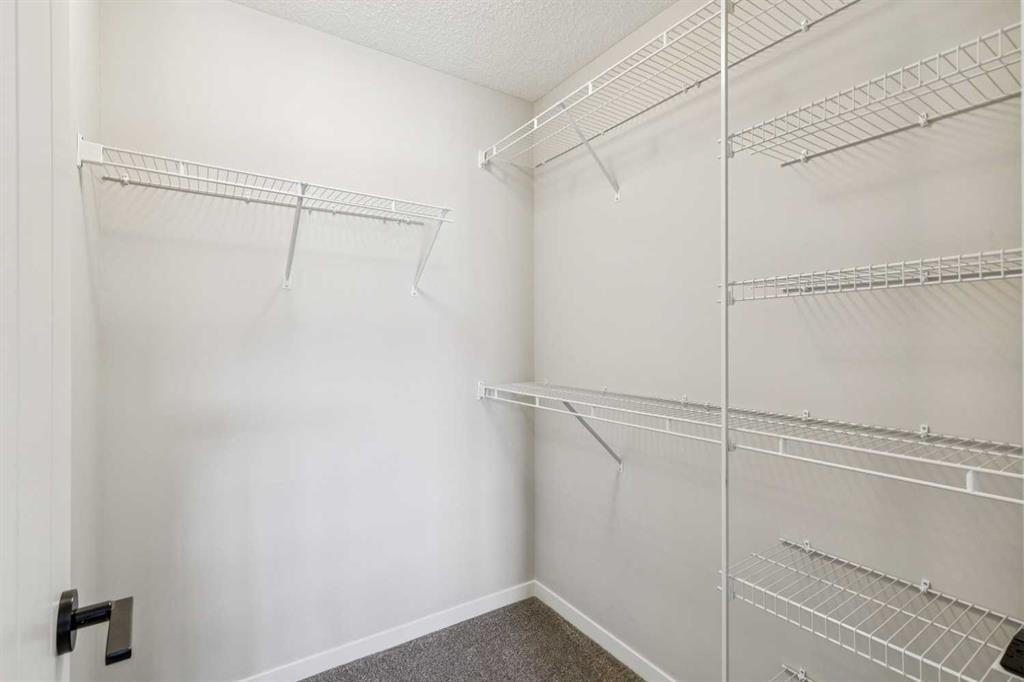 43 Willow Crescent, Okotoks, AB - Indoor With Storage
