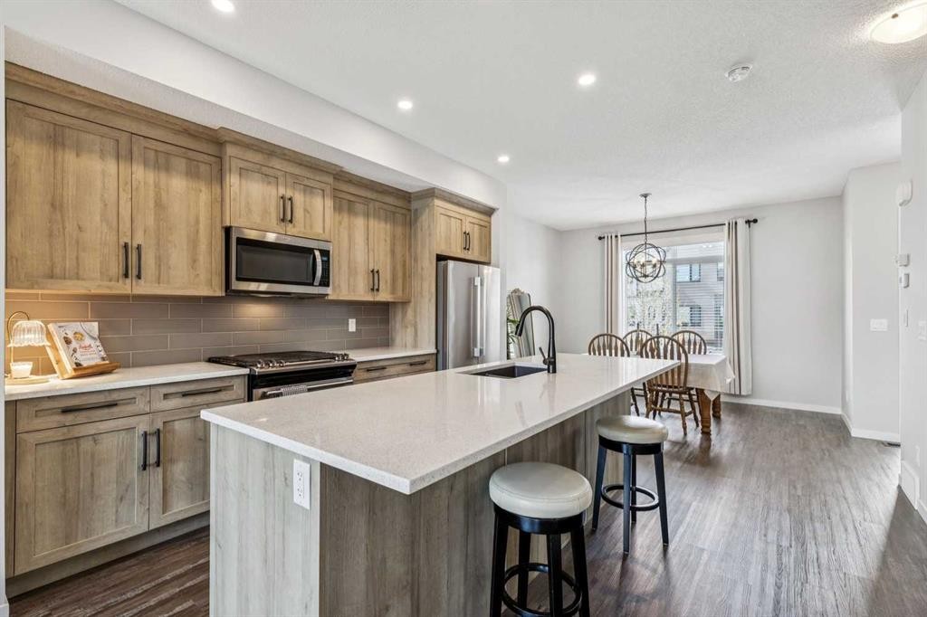 43 Willow Crescent, Okotoks, AB - Indoor Photo Showing Kitchen With Stainless Steel Kitchen With Upgraded Kitchen