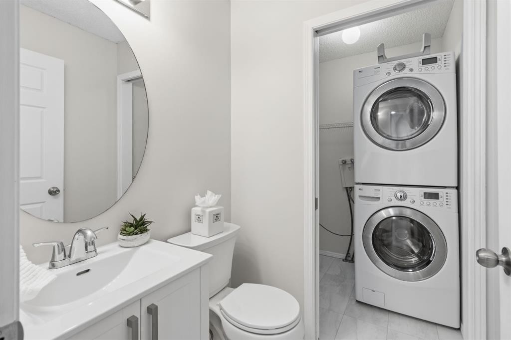 128 Valley Brook Circle Nw, Calgary, AB - Indoor Photo Showing Laundry Room