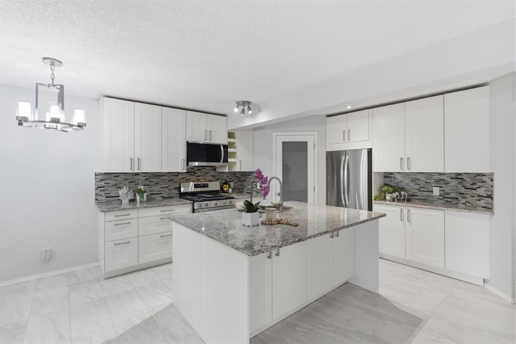 128 Valley Brook Circle Nw, Calgary, AB - Indoor Photo Showing Kitchen With Upgraded Kitchen