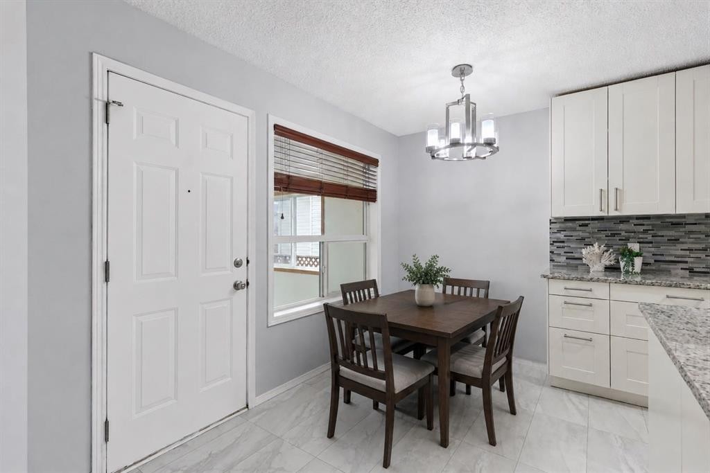 128 Valley Brook Circle Nw, Calgary, AB - Indoor Photo Showing Kitchen With Double Sink With Upgraded Kitchen