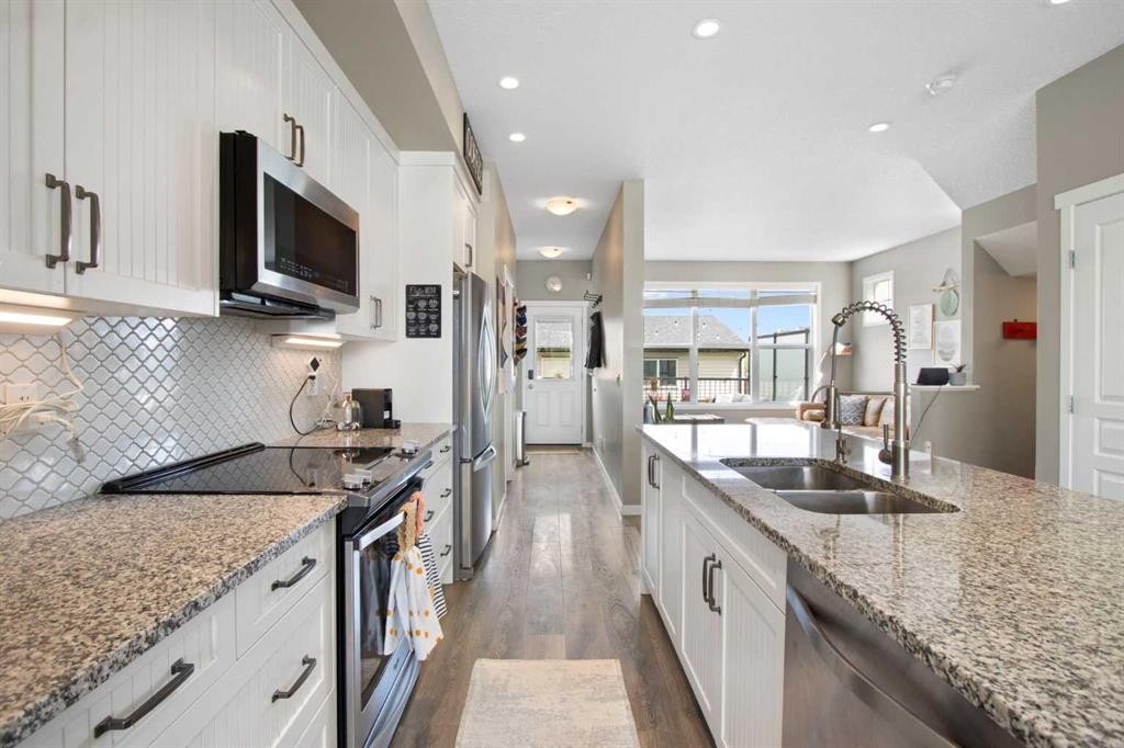 7 Masters Square Se, Calgary, AB - Indoor Photo Showing Kitchen With Stainless Steel Kitchen With Double Sink With Upgraded Kitchen