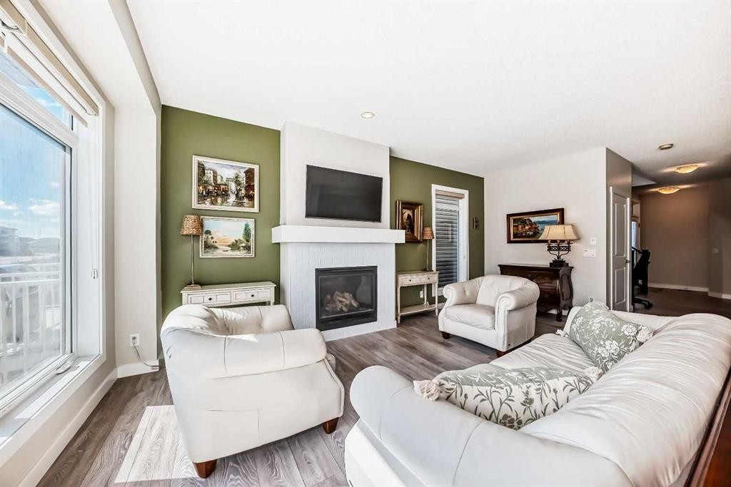 39 Sage Bluff Mews Nw, Calgary, AB - Indoor Photo Showing Living Room With Fireplace