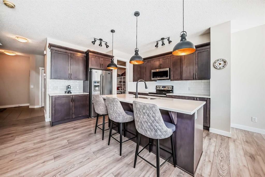 39 Sage Bluff Mews Nw, Calgary, AB - Indoor Photo Showing Kitchen With Stainless Steel Kitchen With Upgraded Kitchen