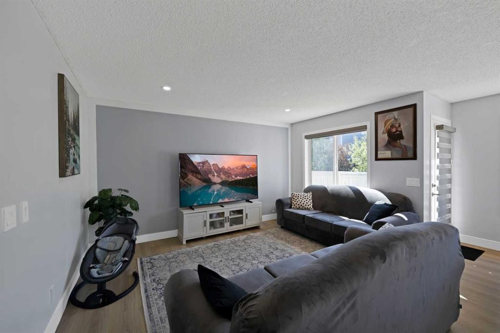 218 Saddlefield Place Ne, Calgary, AB - Indoor Photo Showing Living Room
